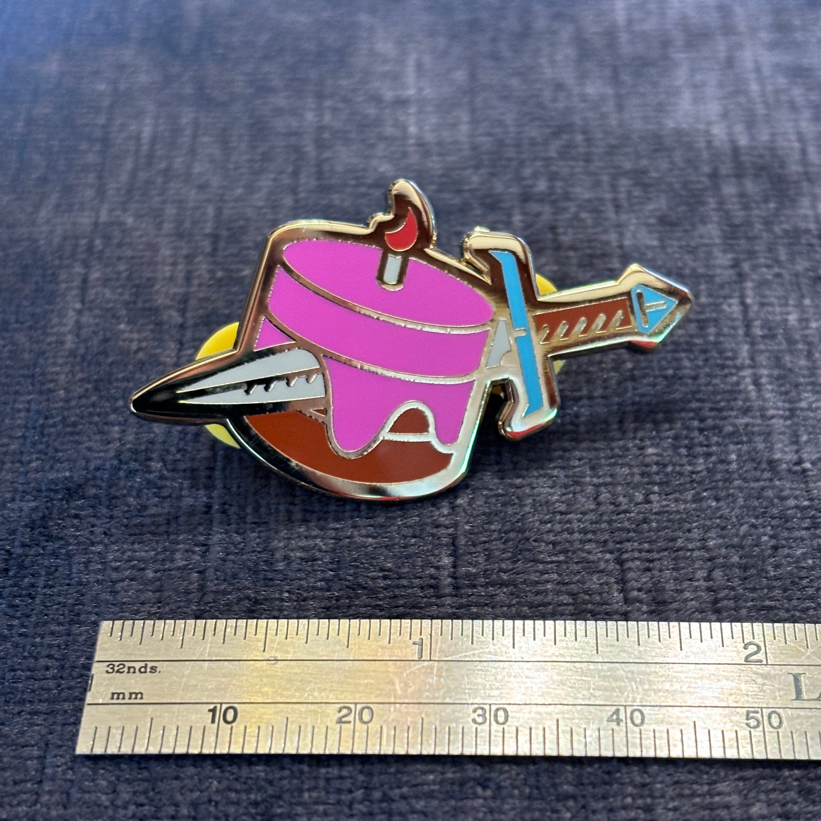 Cake Dagger Enamel Pin – Sweet on the Surface, Sharp in Style