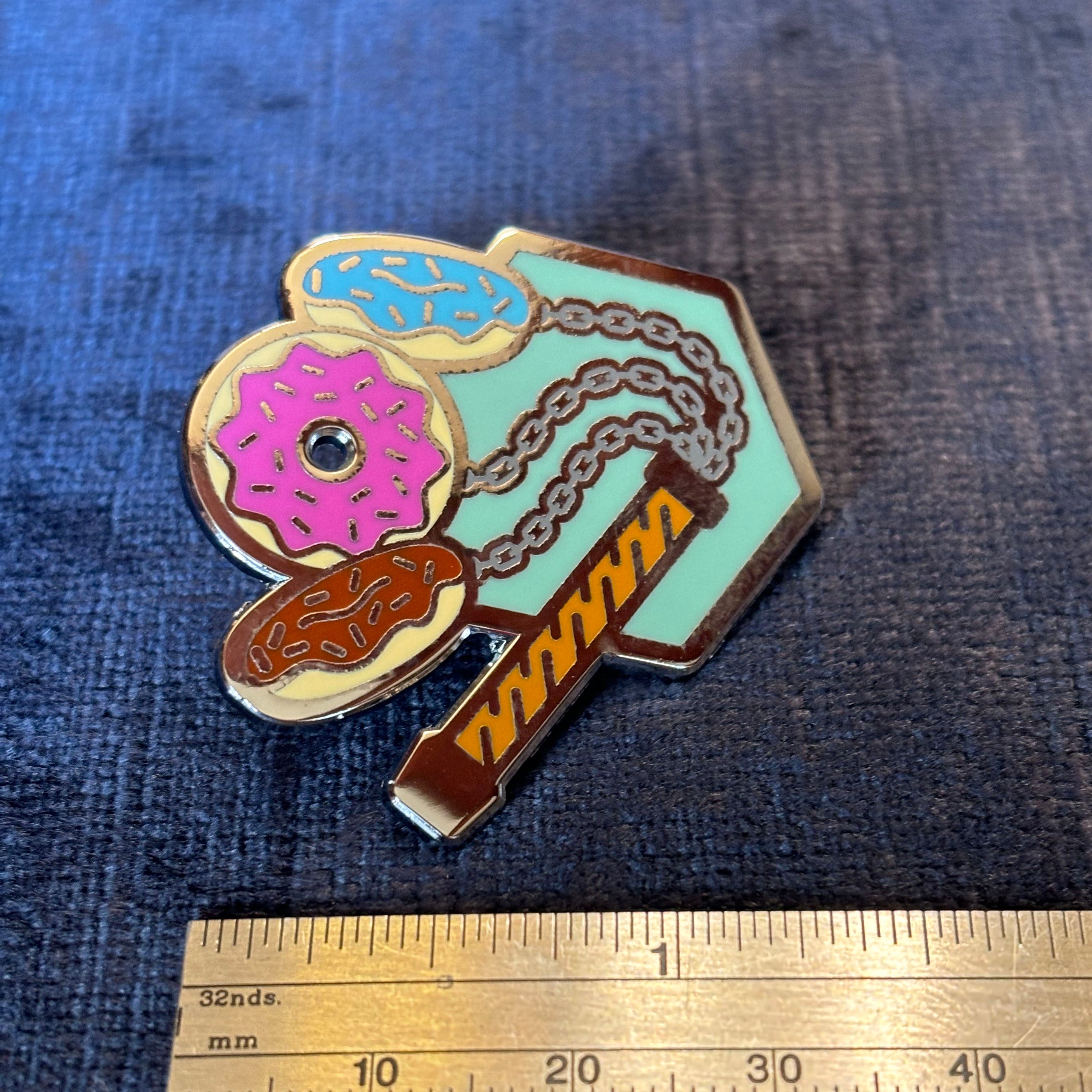 Donut Flail Enamel Pin – Deliciously Dangerous Accessory