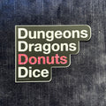 Dungeons, Dragons, Donuts, Dice Vinyl Sticker – Four Essentials, One Bold Design